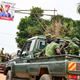 Ugandan security officers patrol an area near the home of presidential candidate and singer Robert Kyagulanyi, known as Bobi Wine in the Magere neighborhood of Kampala, Uganda Jan. 16, 2021.